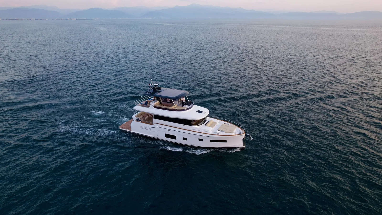 The flagship motor yacht under way on the Bay of Banderas