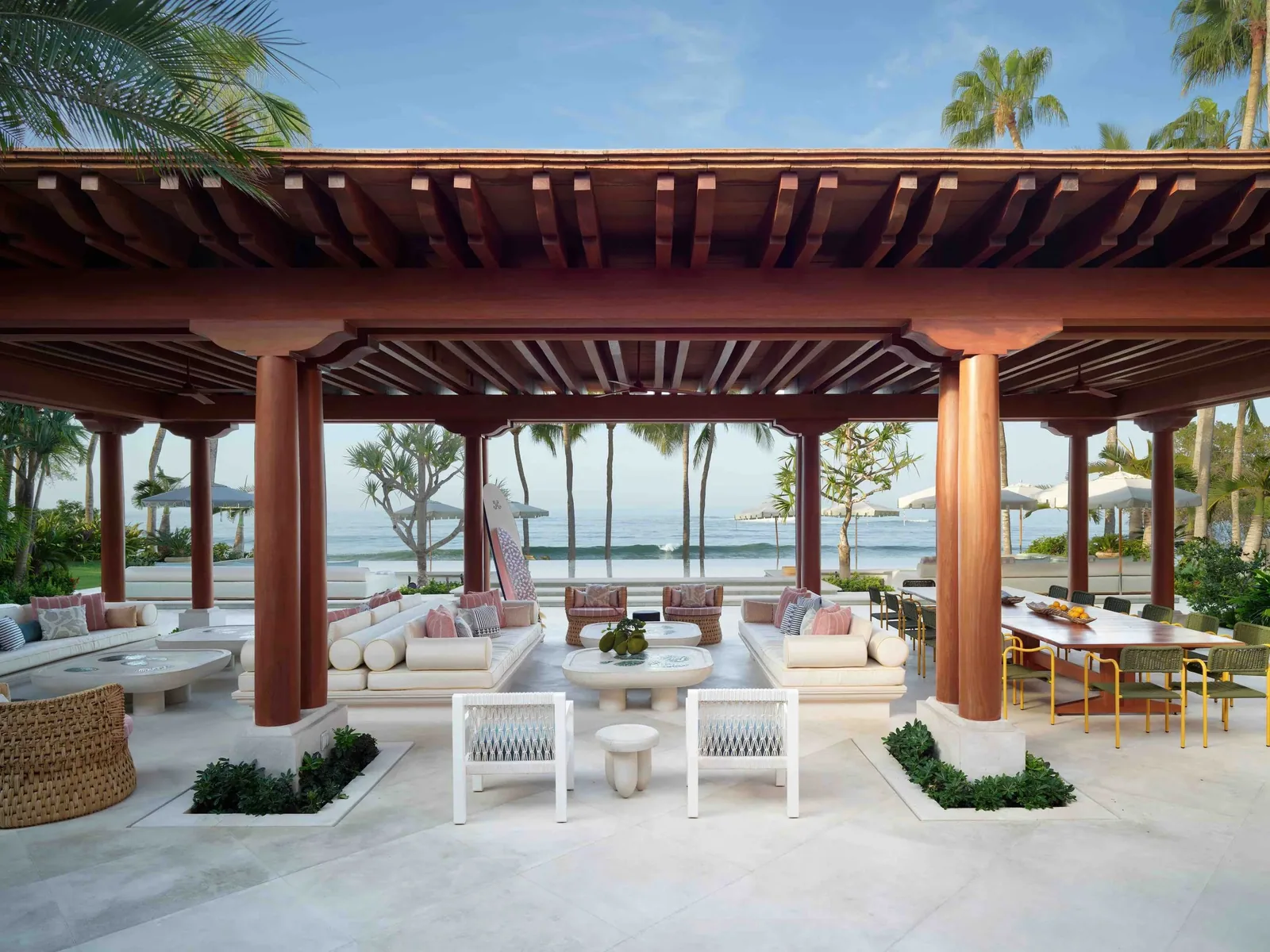 The covered oceanfront pavilion and the lava-tiled pool beyond