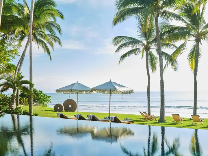 The 23-metre lap and wading pool, its umbrellas and loungers facing the Pacific